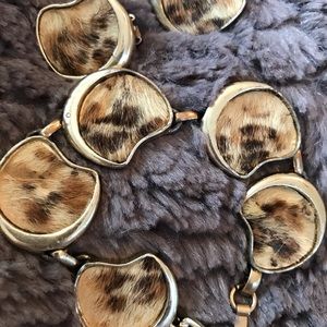 Vintage gold toned fur bracelet with matching clip on earrings.